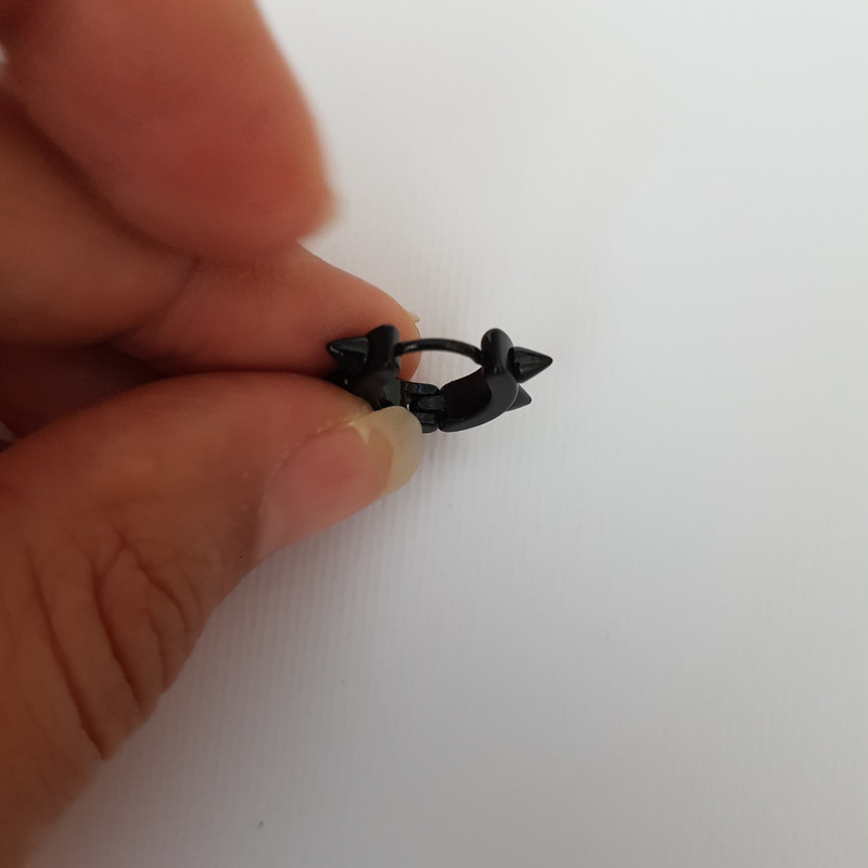 پیرسینگ زنانه مدل مثلثی