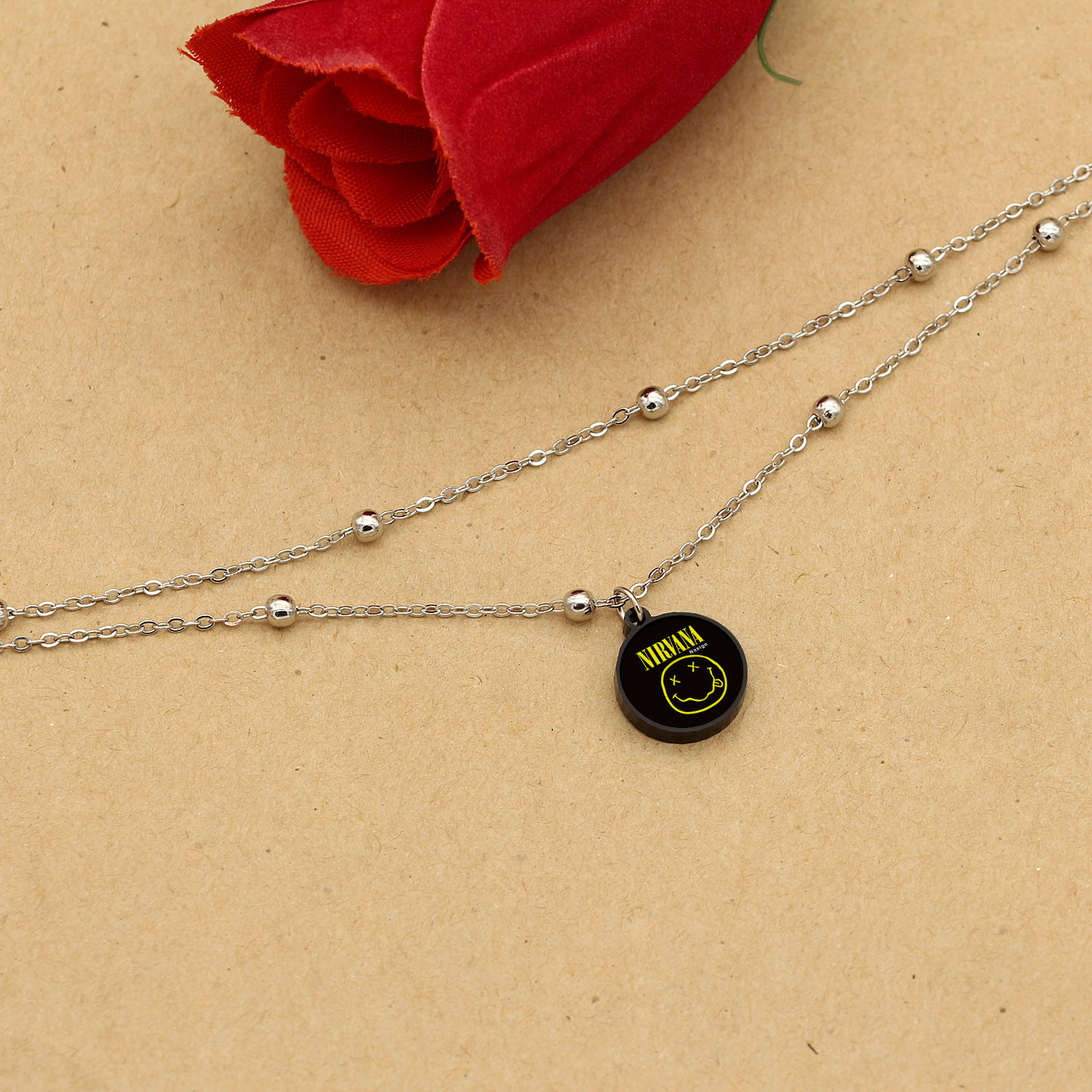 پابند زنانه ناکسیگو مدل شب تاب طرح Nirvana کد LB7449