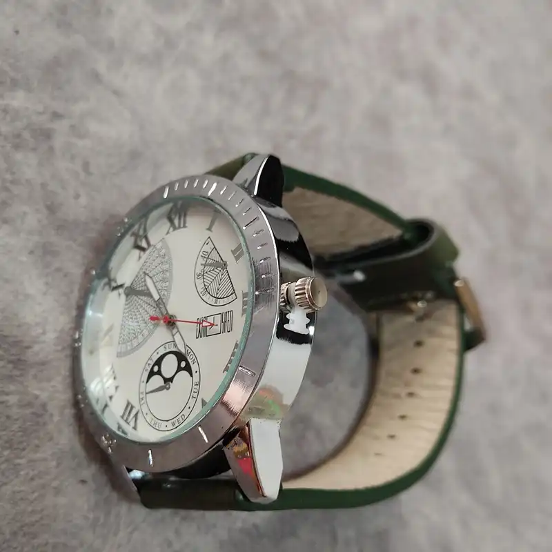 ساعت مچی عقربه ای مدل بند چرم کد 0012