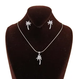 نیم ست نقره زنانه بازرگانی میلادی مدل نخل کد NTR_297