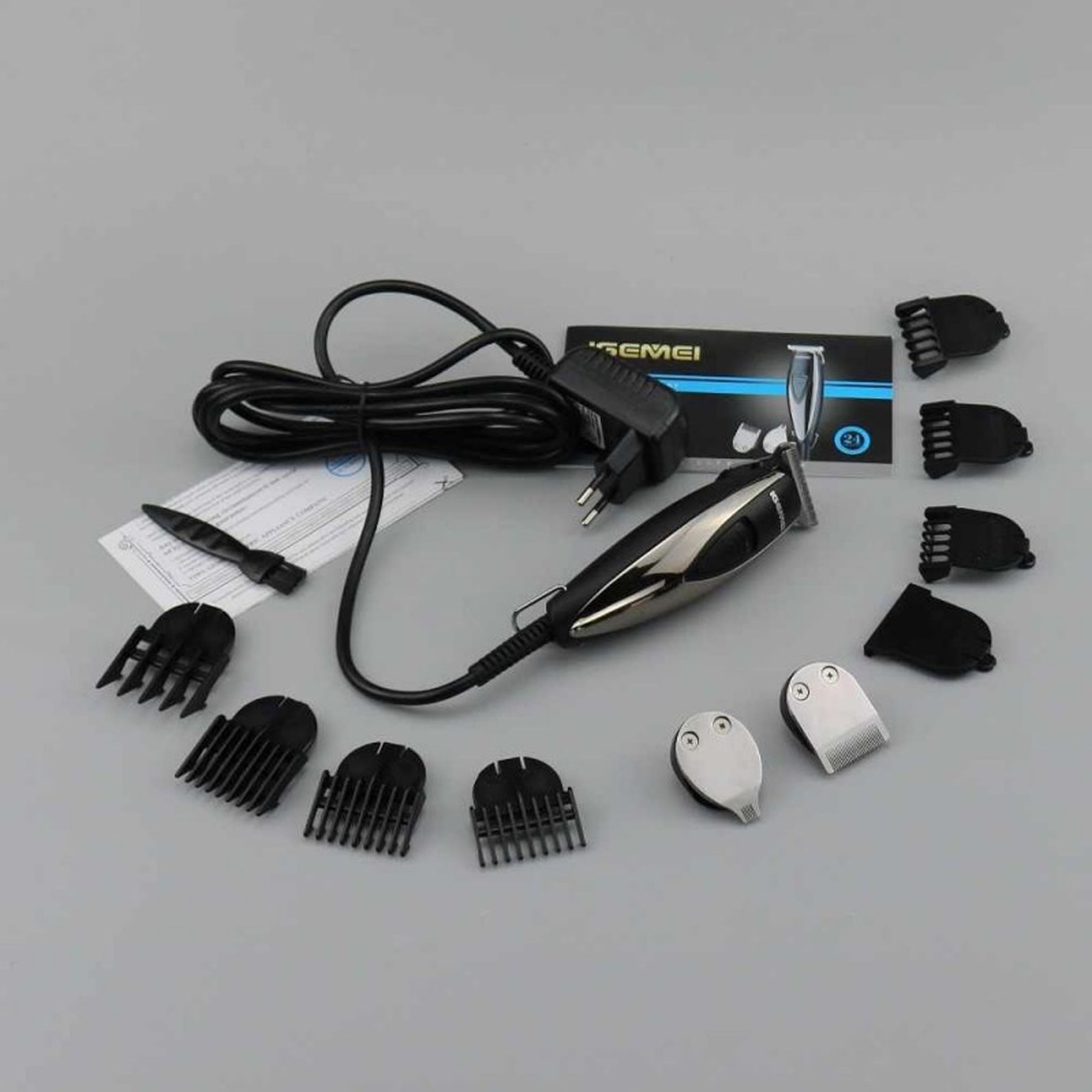 ماشین اصلاح موی سر و صورت و بدن جیمی مدل GM-830، اصلاح به صورت خط زن، قابلیت تنظیم سرعت، منبع انرژی با آداپتور برق، تکنولوژی اصلاح به صورت برش مستقیم، اندازه اصلاح 0.2 میلی‌متر، به‌همراه برس تمیزکننده -  - 5
