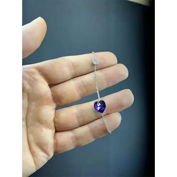 دستبند نقره زنانه سواروسکی مدل 02