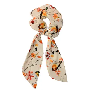 کش مو زنانه دلنار گالری مدل اسکرانچی پرنده و برگ پاییزی