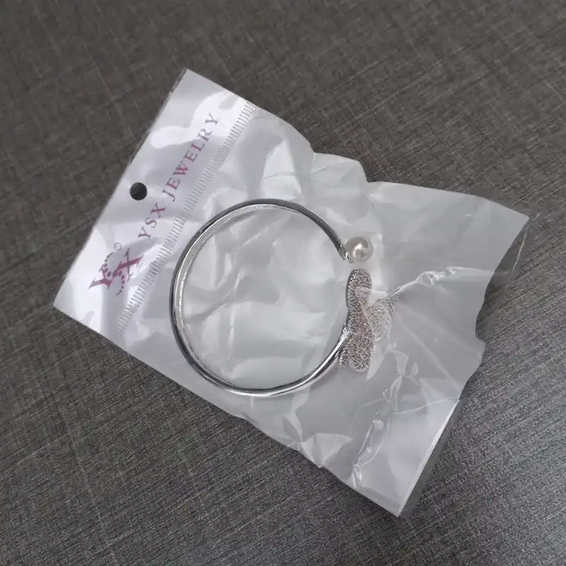 دستبند زنانه وای اس ایکس مدل پروانه و مروارید