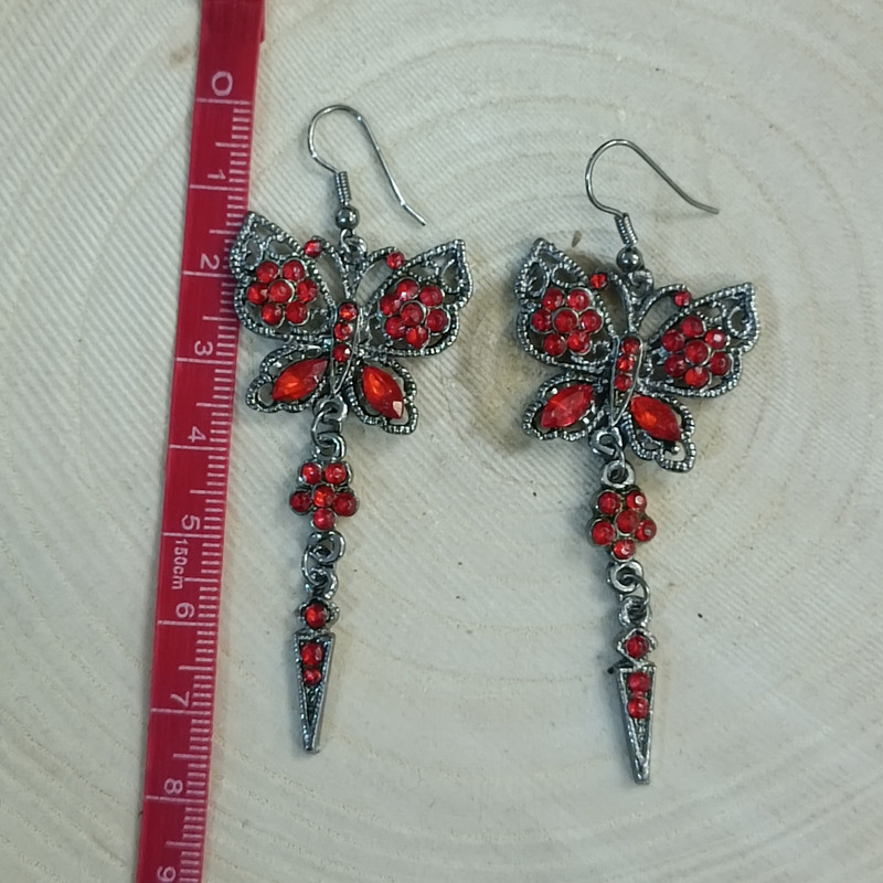 گوشواره زنانه مدل پروانه هندی نگین دار گوشواره زنانه مدل پروانه هندی نگین دار