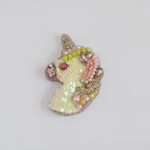 گل سینه زنانه طرح یونیکورن