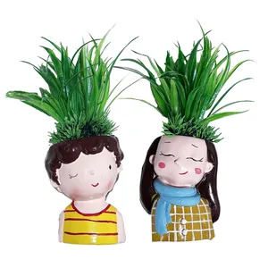 گلدان به همراه گل مصنوعی مدل دختر و پسر رزماری مجموعه 2 عددی