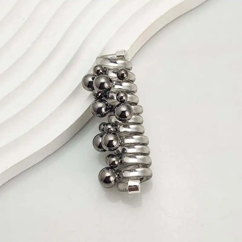 کش مو زنانه مدل فنری طرح دانه های برفی