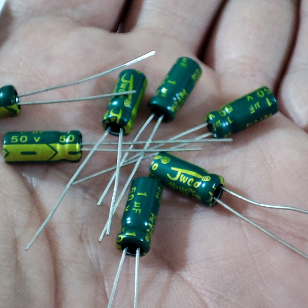 خازن الکترولیت 1 میکرو فاراد 50 ولت جی دبلیو کو کد SC03 بسته 6 عددی