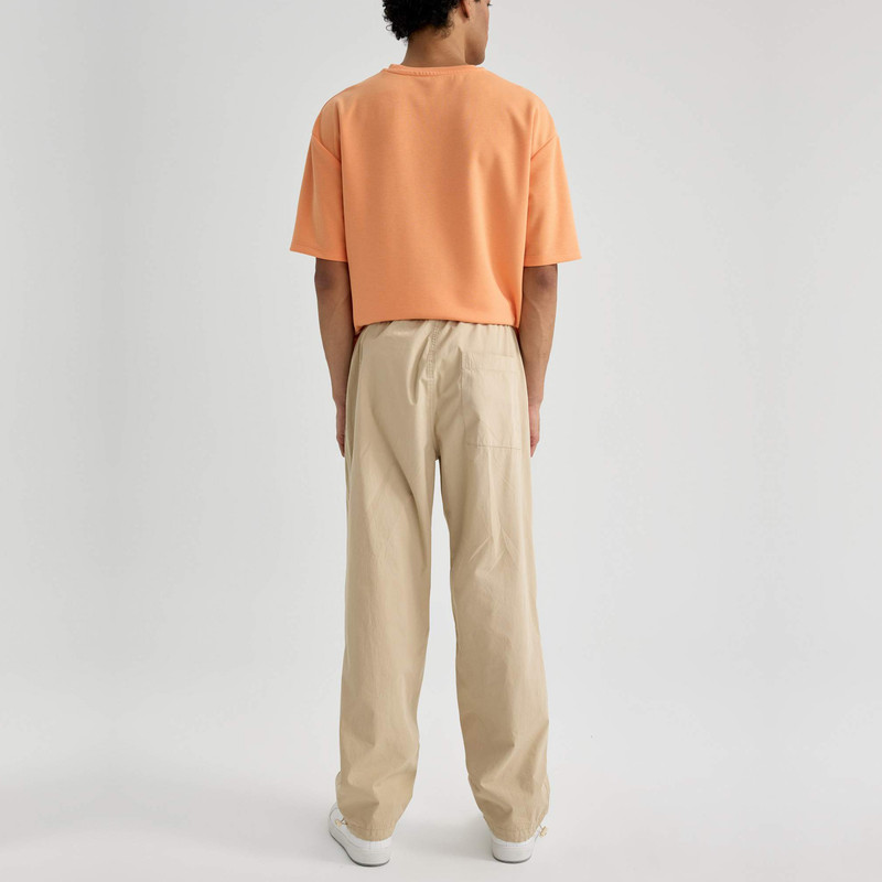 شلوار آزاد مردانه دفکتو مدل 053BG732 رنگ بژ