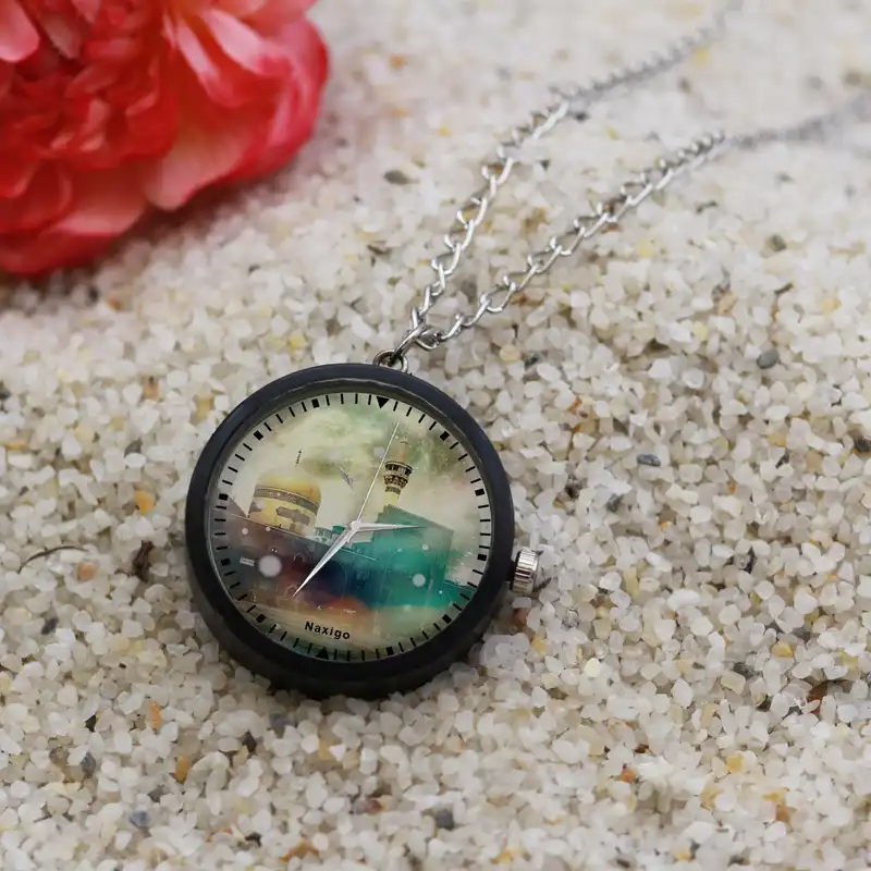 ساعت گردنبندی عقربه ای ناکسیگو مدل حرم امام رضا کد NF12653