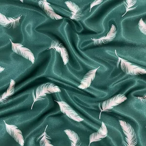 پارچه لباس عرض 1.5 متر مدل ساتن ابریشم طرح پر رنگ سبز تیره
