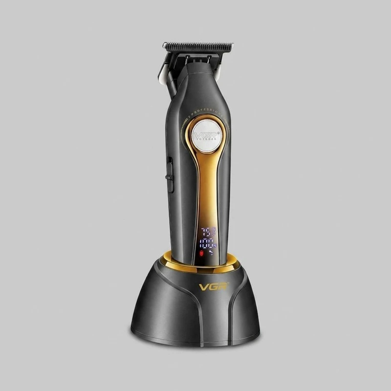 ماشین اصلاح موی سر و صورت وی جی ار مدل V-993 با تیغه سرامیکی، قابلیت اصلاح با شماره صفر، خط زن، نمایشگر میزان شارژ، باتری قابل شارژ، مدت زمان استفاده 180 دقیقه، همراه با 4 عدد شانه