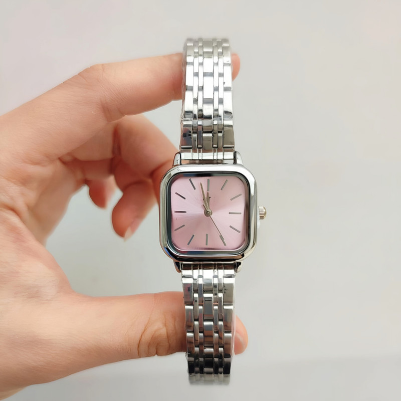 ساعت مچی عقربه ای زنانه مدل کژوال بند استیل طرح حصیری کد 1.2