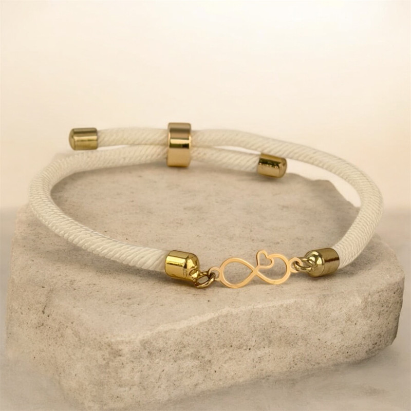 دستبند طلا 18 عیار زنانه با بند بافت کرابو مدل بی نهایت و قلب