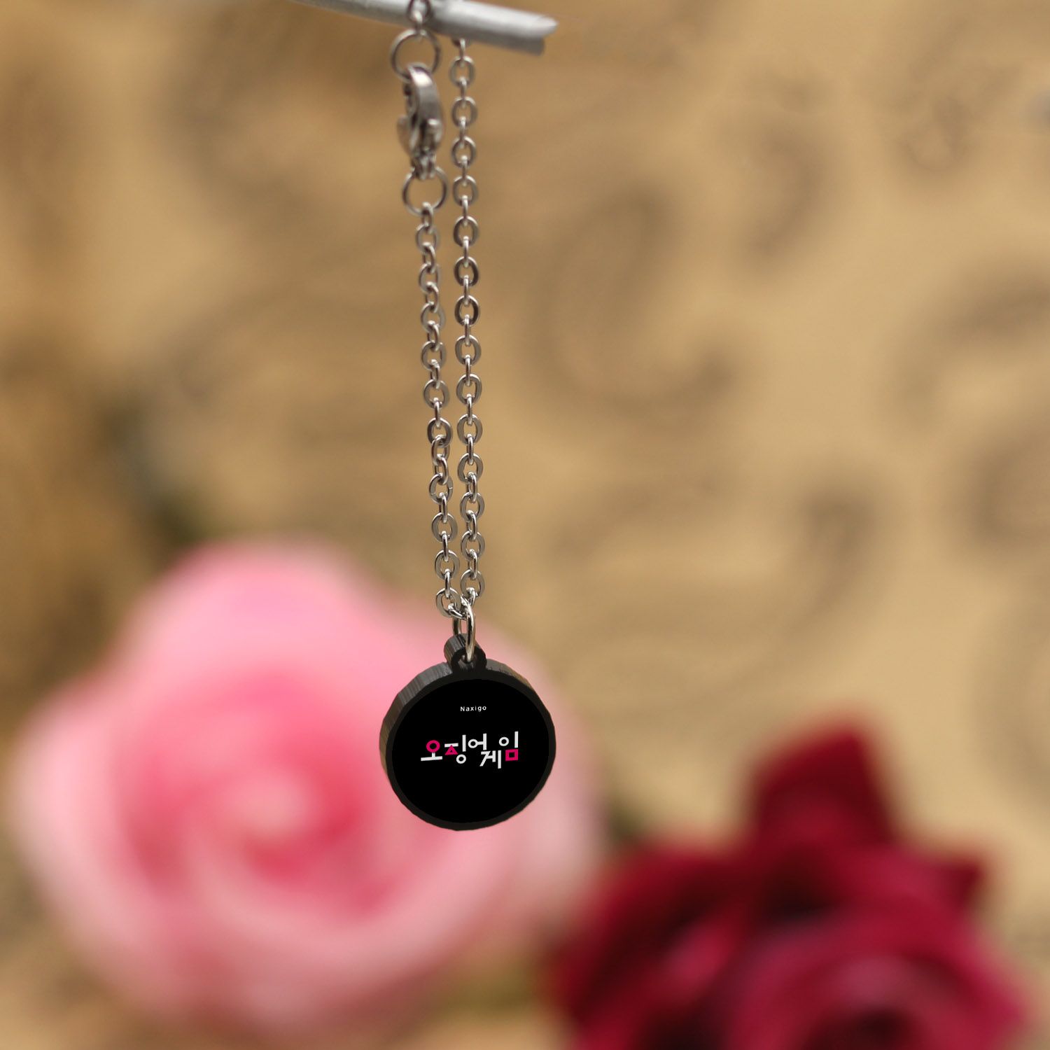 آویز ساعت زنانه ناکسیگو مدل شب تاب طرح اسکوئید گیم کد AW8783 -  - 4