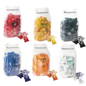 خرما شکلاتی ساده، قهوه، تلخ، سفید، پرتقالی و موز با مغز بادام دلوکا - ۵۰۰ گرم بسته 6 عددی