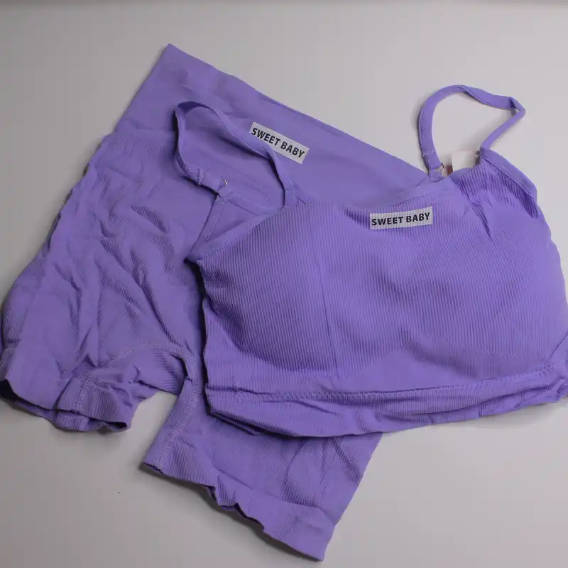 ست نیم تنه و شلوارک ورزشی زنانه مدل سیملس پد دار رنگ بنفش