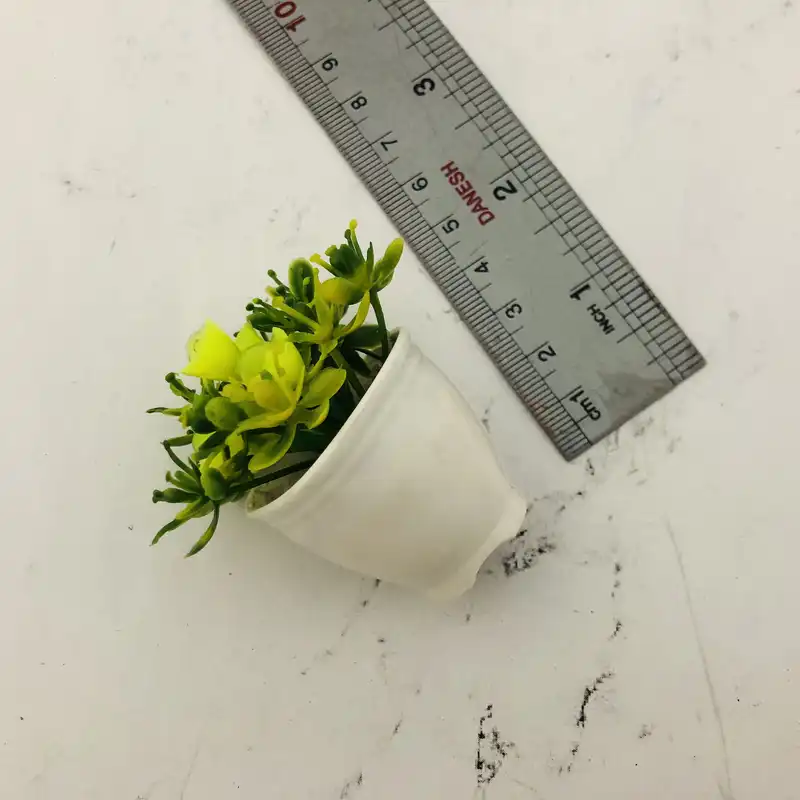 گلدان به همراه گل مصنوعی مدل مینی2 مجموعه 4 عددی