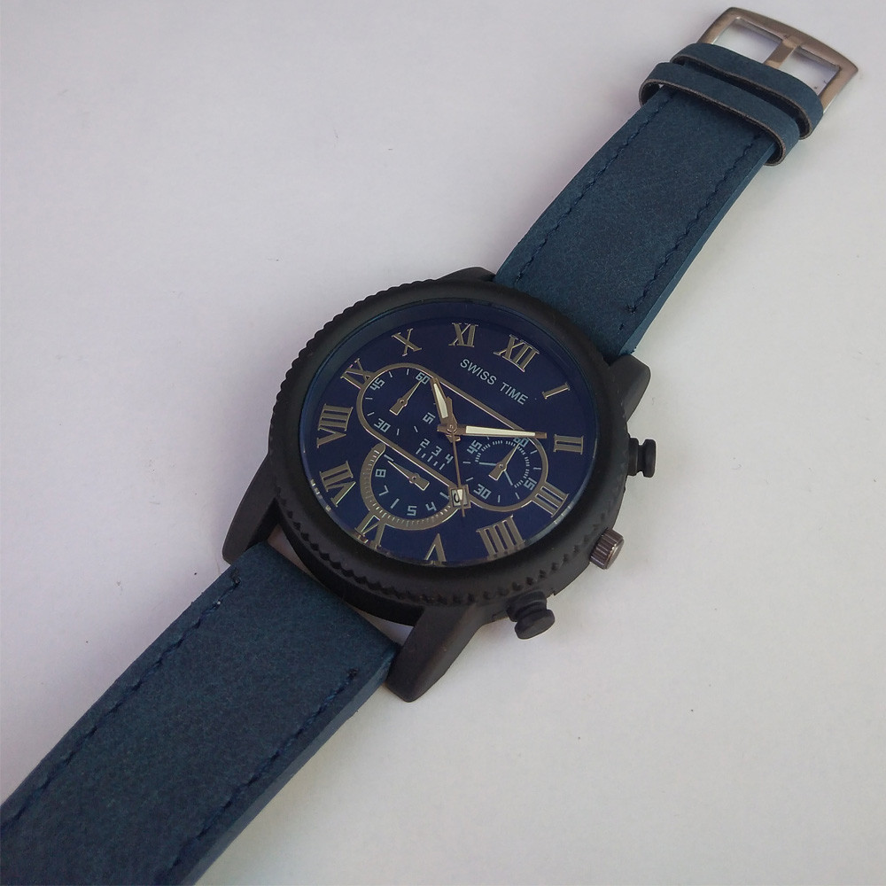 ساعت مچی عقربه ای پسرانه مدل بند چرمی کد 009 ساعت مچی عقربه ای پسرانه مدل بند چرمی کد 009