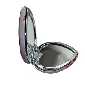 آینه آرایشی تاشو جیبی مدل قلب خط خطی