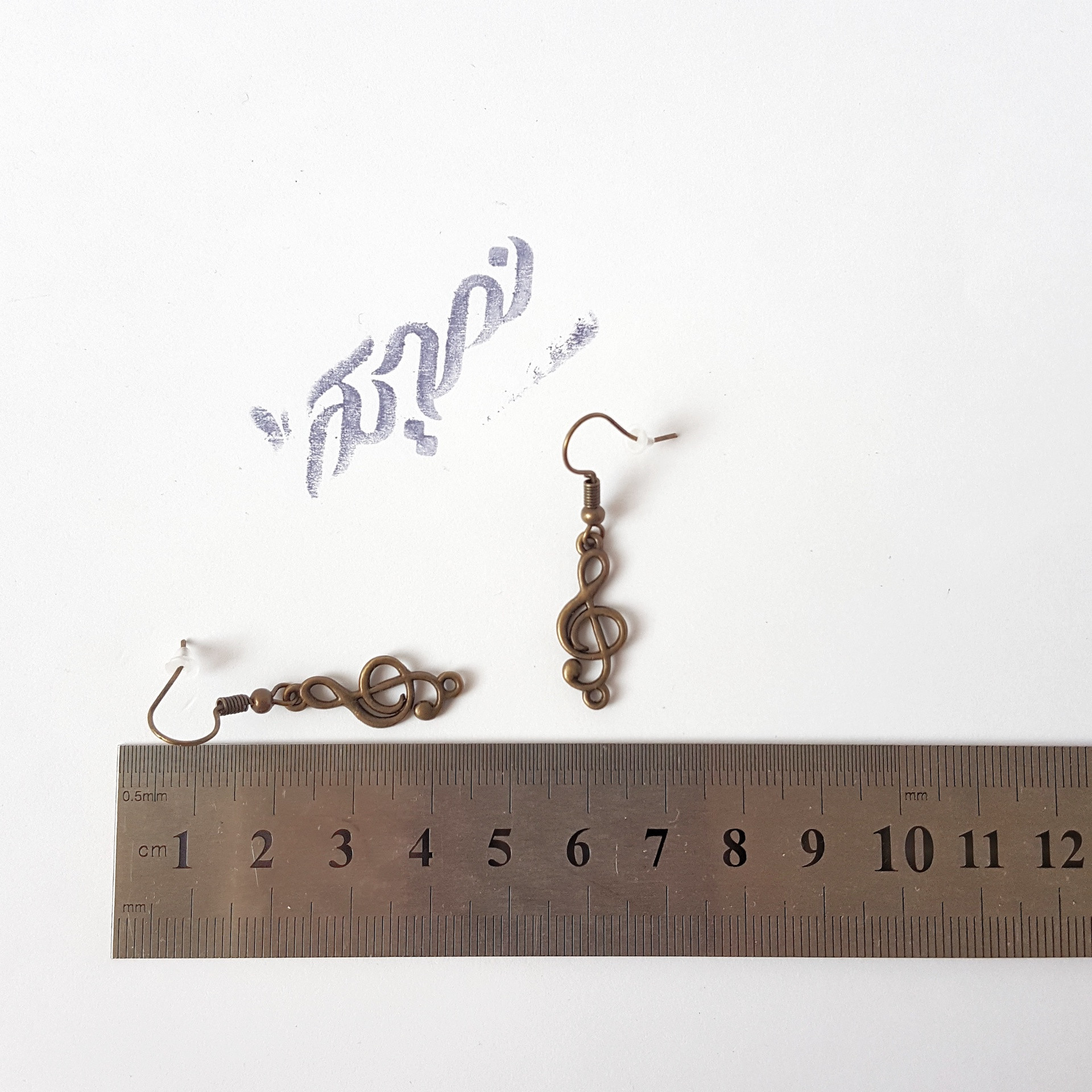 گوشواره دخترانه نمدیکا طرح کلید سل گوشواره دخترانه نمدیکا طرح کلید سل