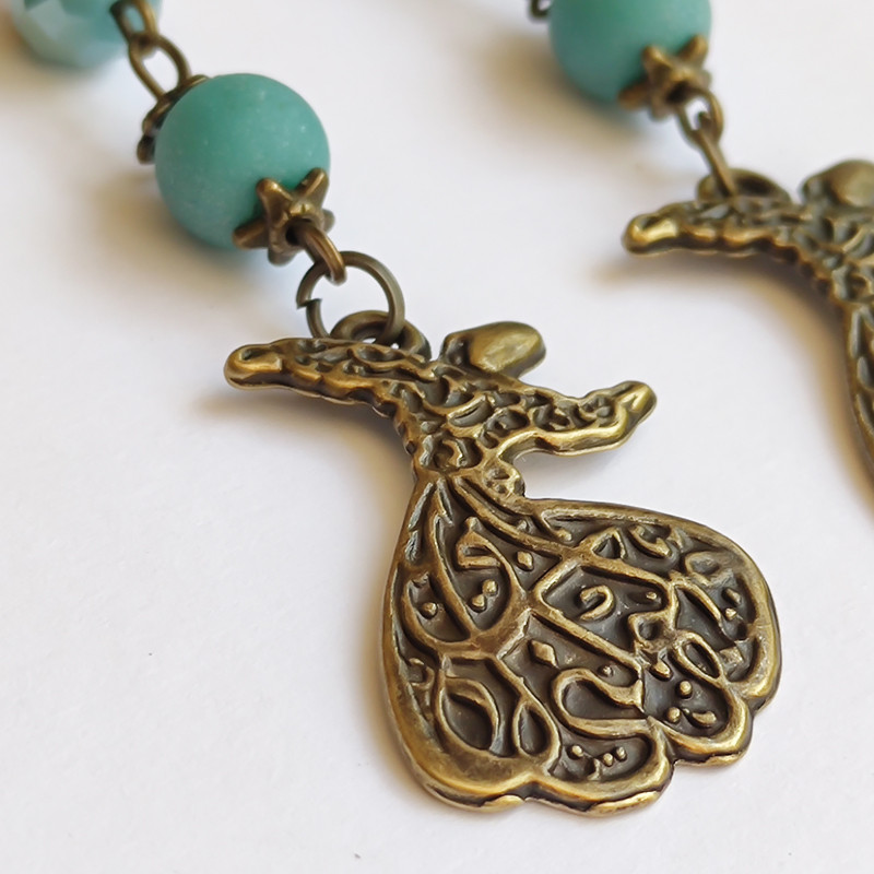 گوشواره زنانه مدل رقص سما گوشواره زنانه مدل رقص سما