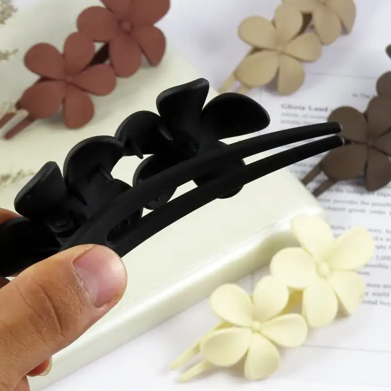 کلیپس مو زنانه مدل منقاری گل بابونه کد G_Lnd_1466