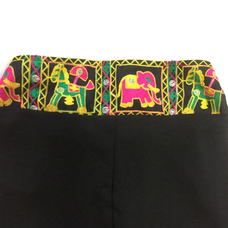 عکس شماره 10 : مانتو و شلوار زنانه مدل نخی ابر و بادی خامه دوزی کد tm-2715