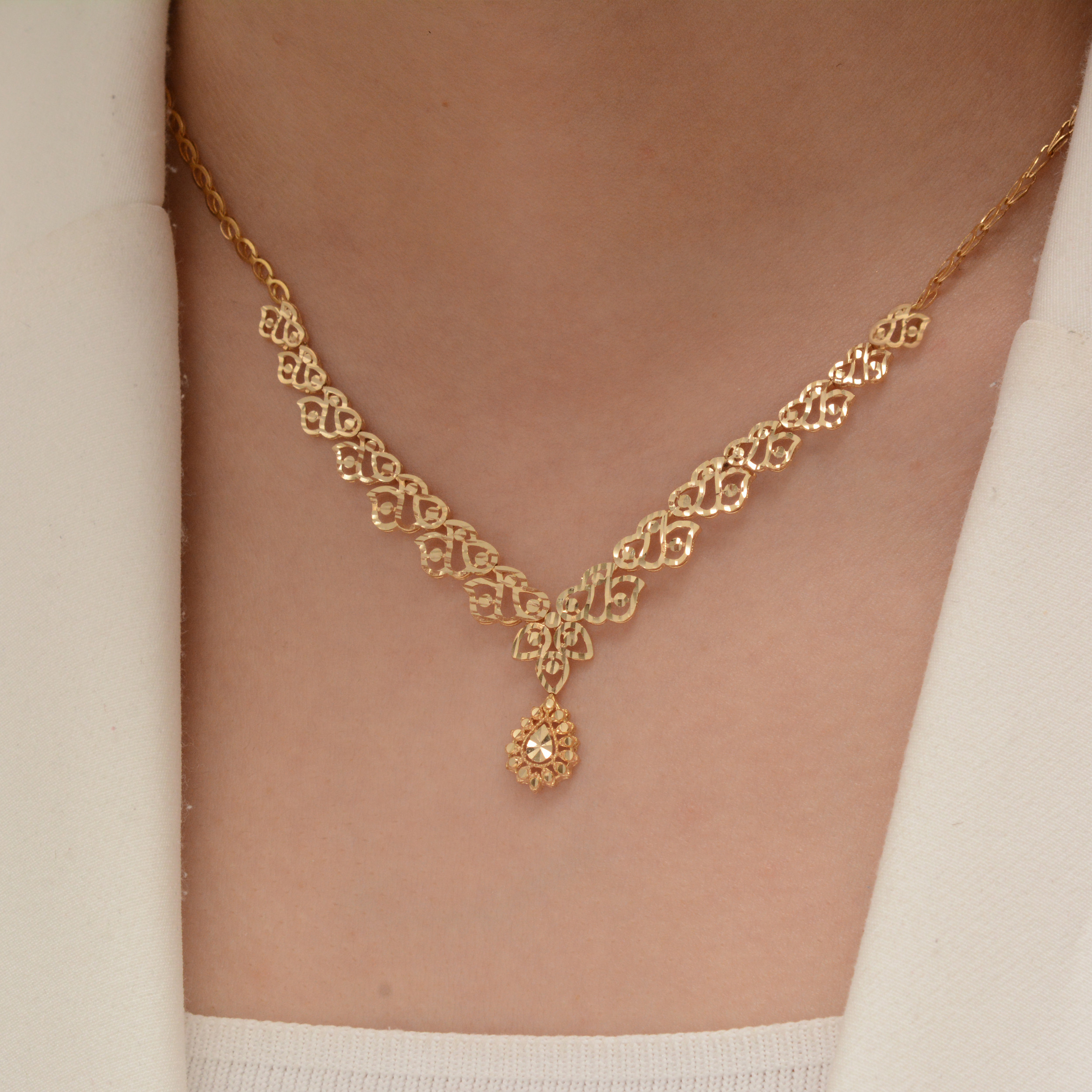 نیم ست طلا 18 عیار زنانه طلای مستجابی مدل طلوع کد 015