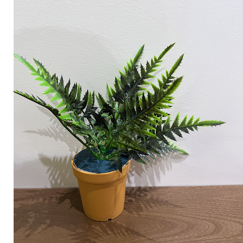 گلدان به همراه گل مصنوعی مدل آکا کاجی بادیان rainblow