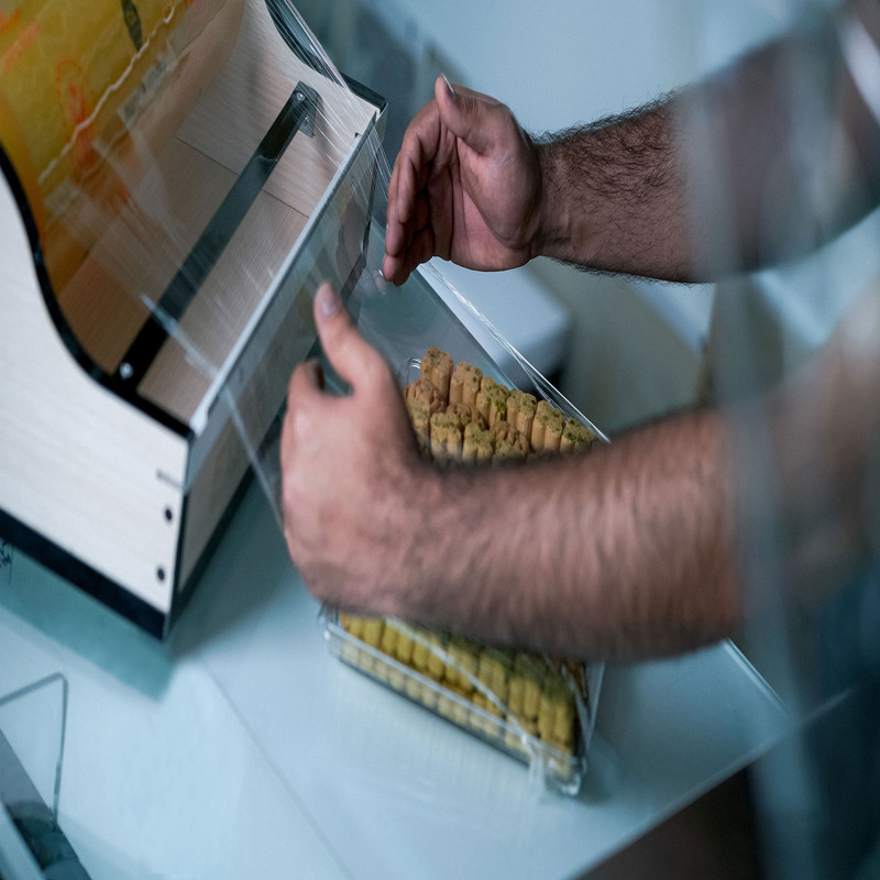 دستگاه سلفون کش ایزیکات کدAt 1002