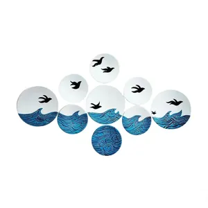 بشقاب دیوار کوب سفالی طرح دریا کد M61 مجموعه ۹ عددی