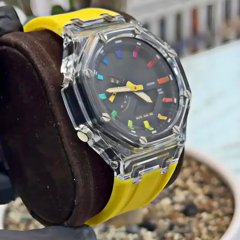 ساعت مچی عقربه ای مدل دوزمانه پمپی قاب شفافy.m