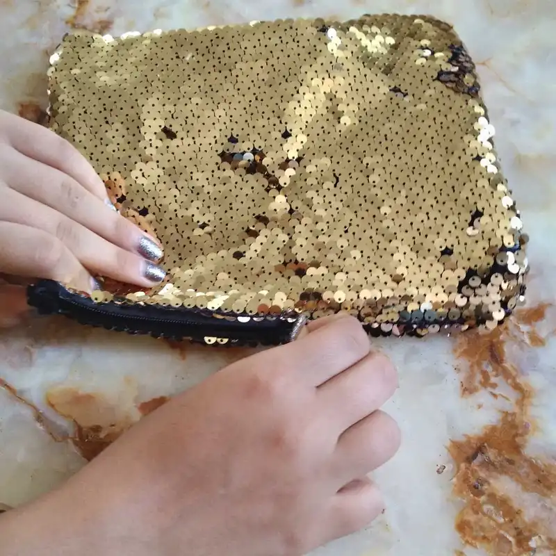 کیف لوازم آرایش زنانه مدل پولکی