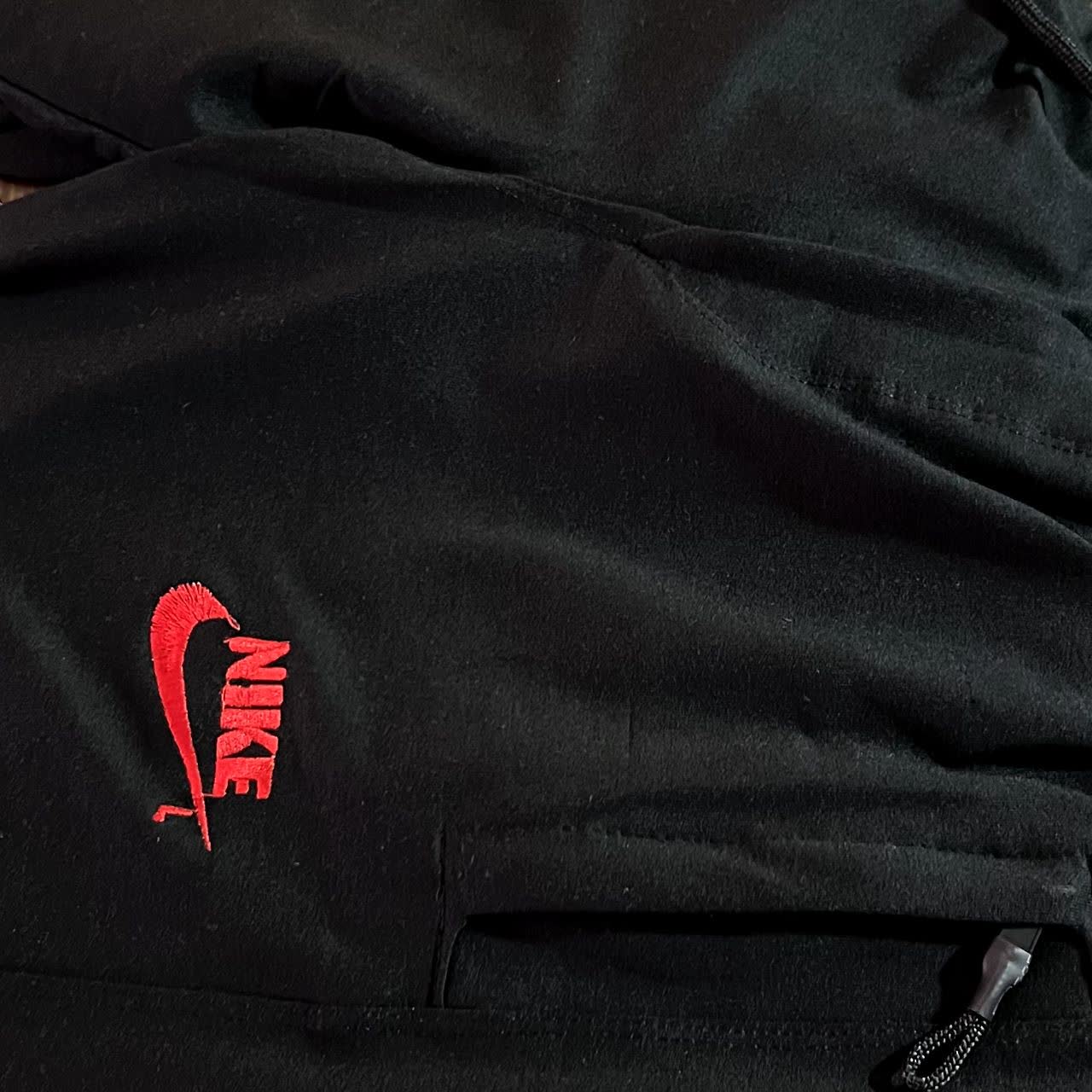 Black nike joggers online red tick