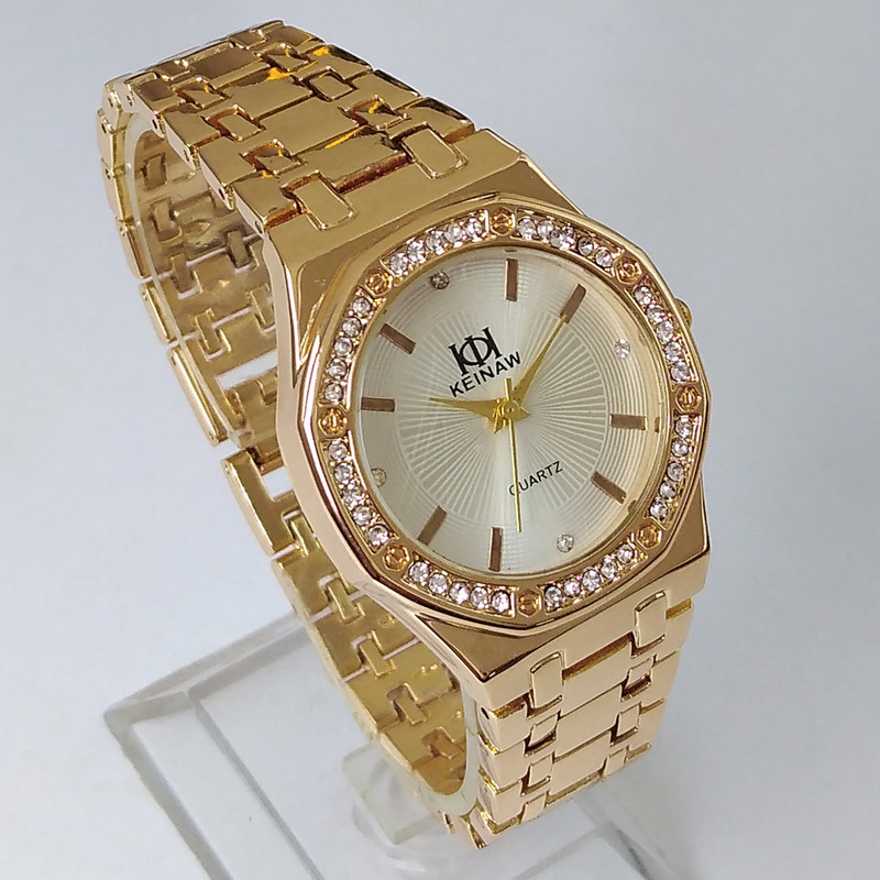 ساعت مچی عقربه ای زنانه مدل بندفلزی نگین دار کد 02 ساعت مچی عقربه ای زنانه مدل بندفلزی نگین دار کد 02