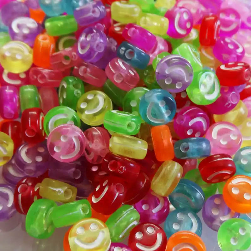 مهره دستبند مدل استیکر خندان پاستیلی کد 1046 بسته 100 عددی