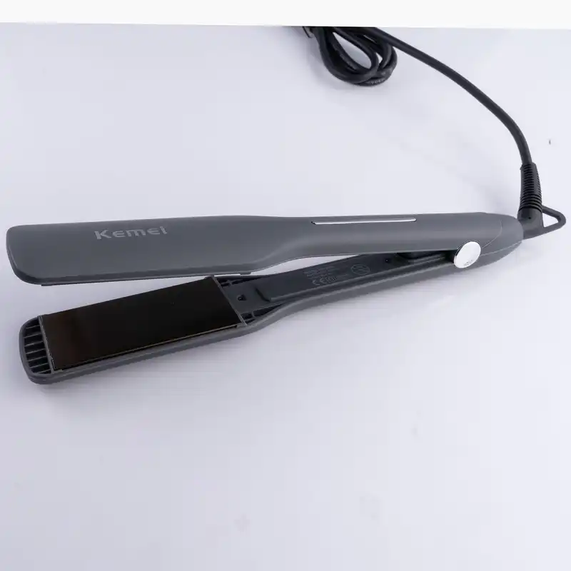 اتو و حالت دهنده ی مو کیمی مدل km9828