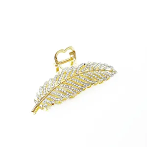 کلیپس مو زنانه مدل فلزی طرح برگ نگینی