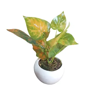 گلدان به همراه گل مصنوعی مدل برگ لمسی کد 041