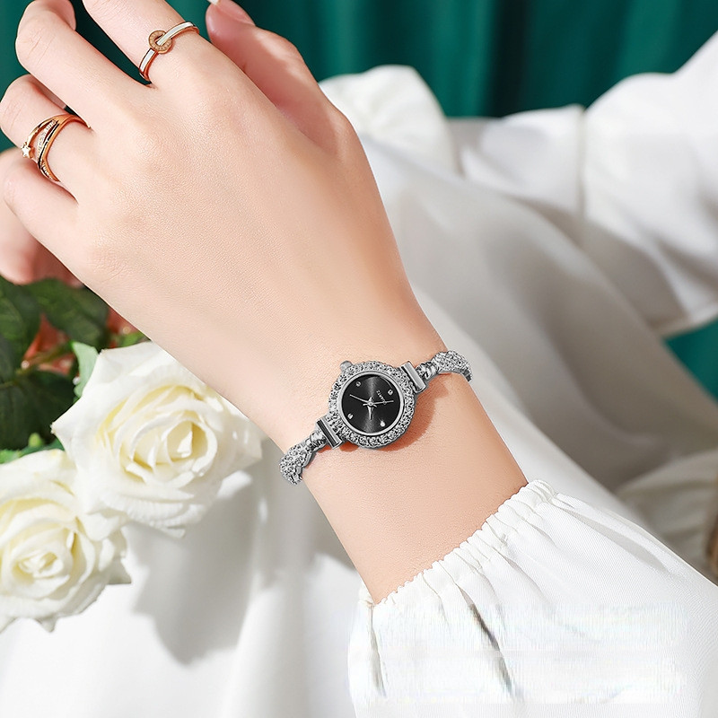 ساعت مچی عقربه ای زنانه مدل بند نگین دار قفل کرواتی کد 07