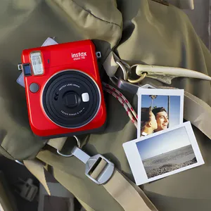 دوربین عکاسی چاپ سریع فوجی فیلم مدل Instax mini 70 همراه با یک بسته فیلم 10 تایی
