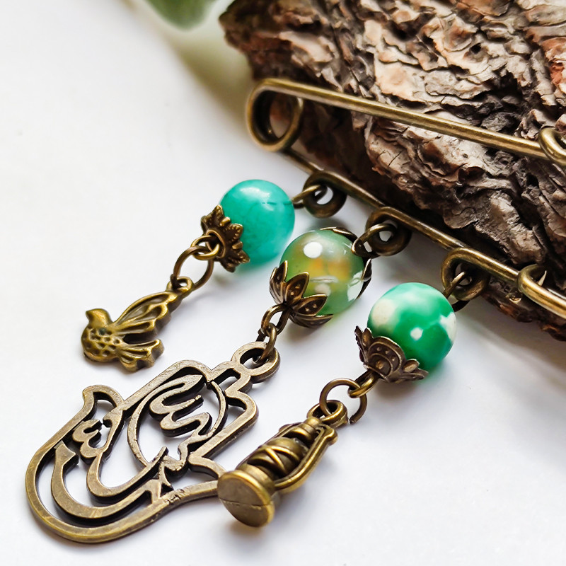 سنجاق سینه زنانه مدل پرنده و فانوس