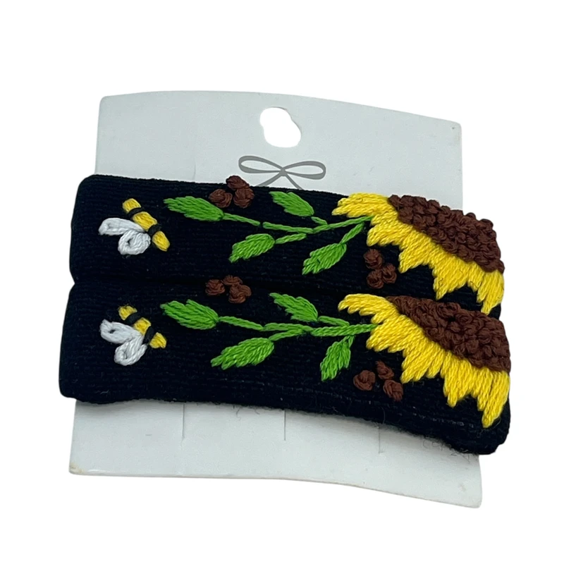 گیره مو دخترانه مدل گل آفتاب گردان بسته 2 عددی