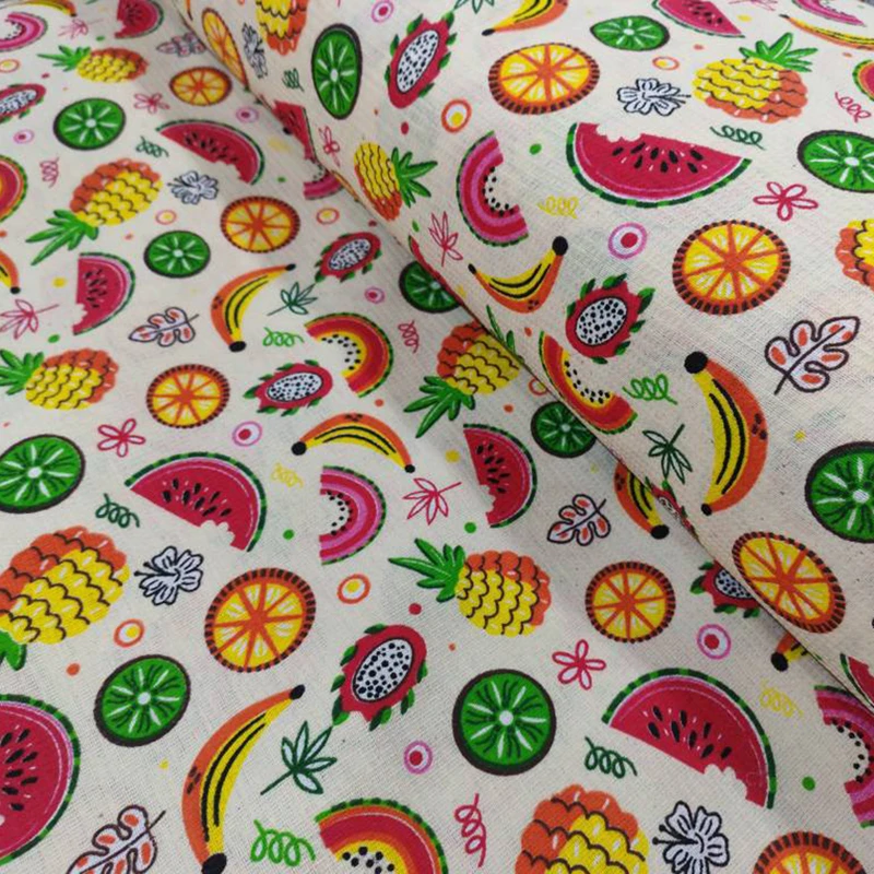 پارچه آشپزخانه عرض 1.5 متر مدل پلی پنبه طرح میوه رنگ کرم