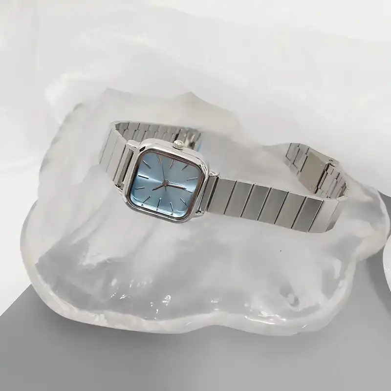 ساعت مچی عقربه ای زنانه مدل کلاسیک بند ریلی فلزی کد 2