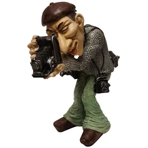 مجسمه تزئینی مدل پسر عکاس