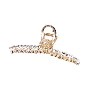 کلیپس مو زنانه مدل خورشیدی نگین دار