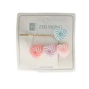 سنجاق مو دخترانه مدل 0004 طرح آبنبات بسته 2 عددی